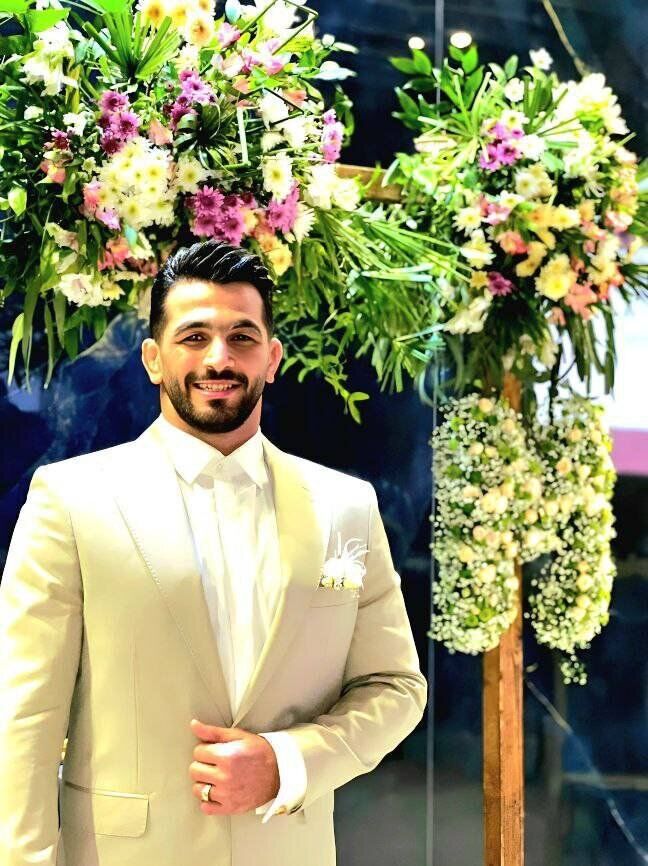 قهرمان کشتی ایران داماد شد؛ تیپ جذاب حسن یزدانی در روز عروسی + عکس