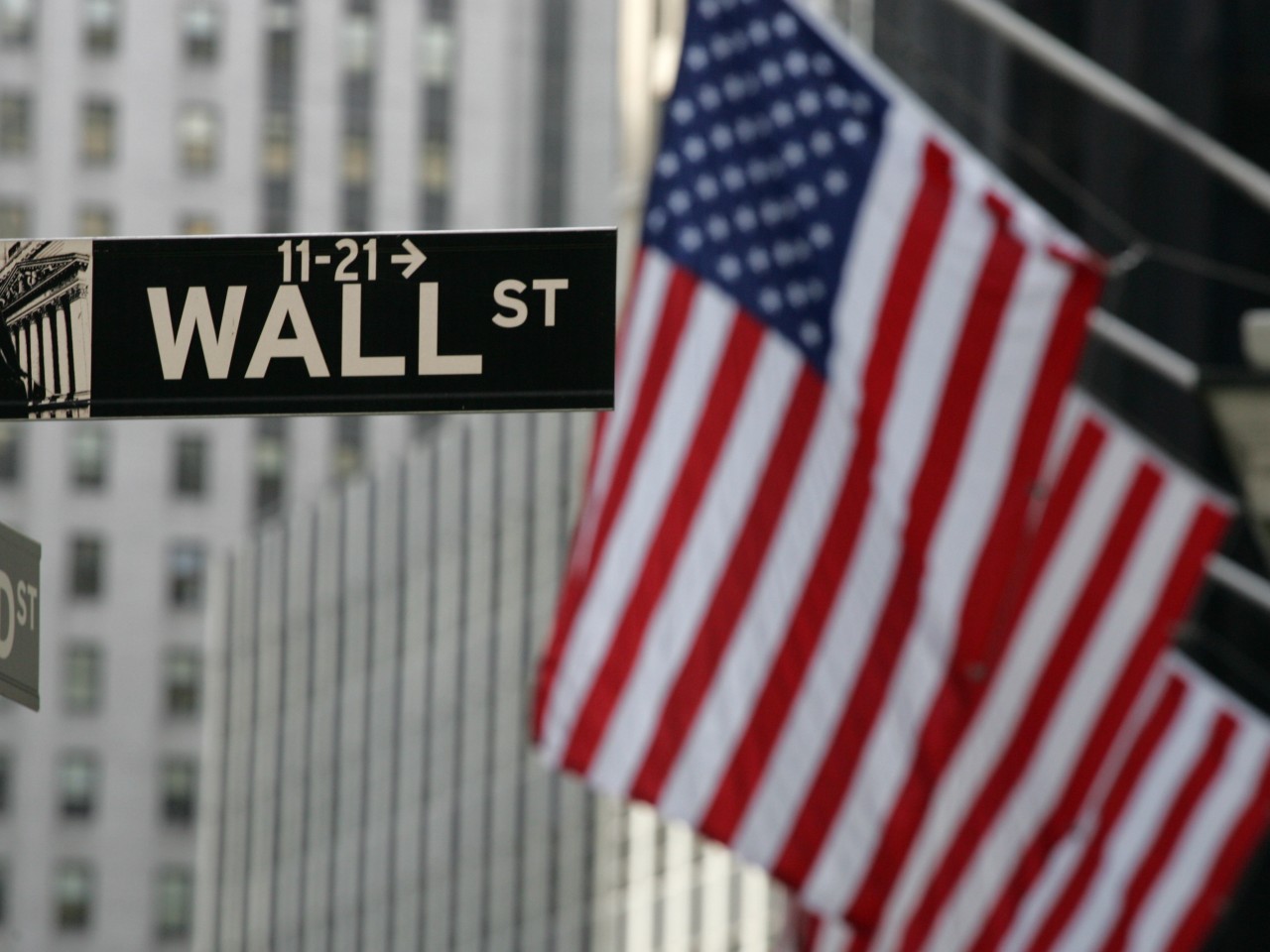 Wall Street opens little changed