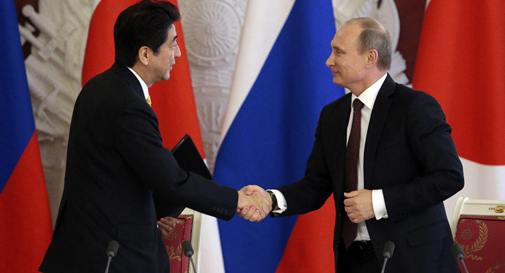 Japan nudges wary firms to invest in Russia to help resolve islands dispute