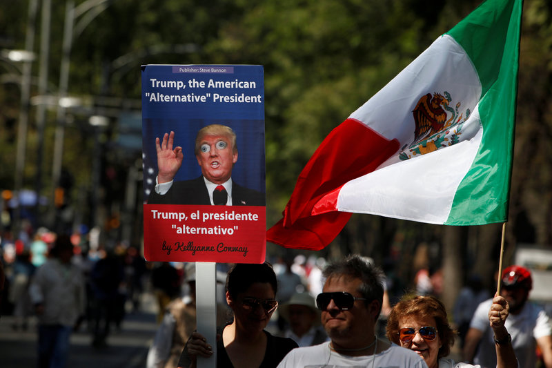 Marchers across Mexico vent anger over Trump, and their own president