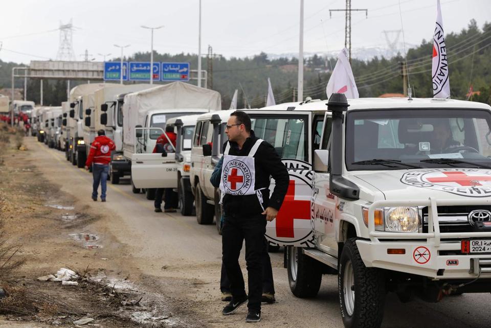 Aid for Syria waits on Turkish border as warring sides bicker