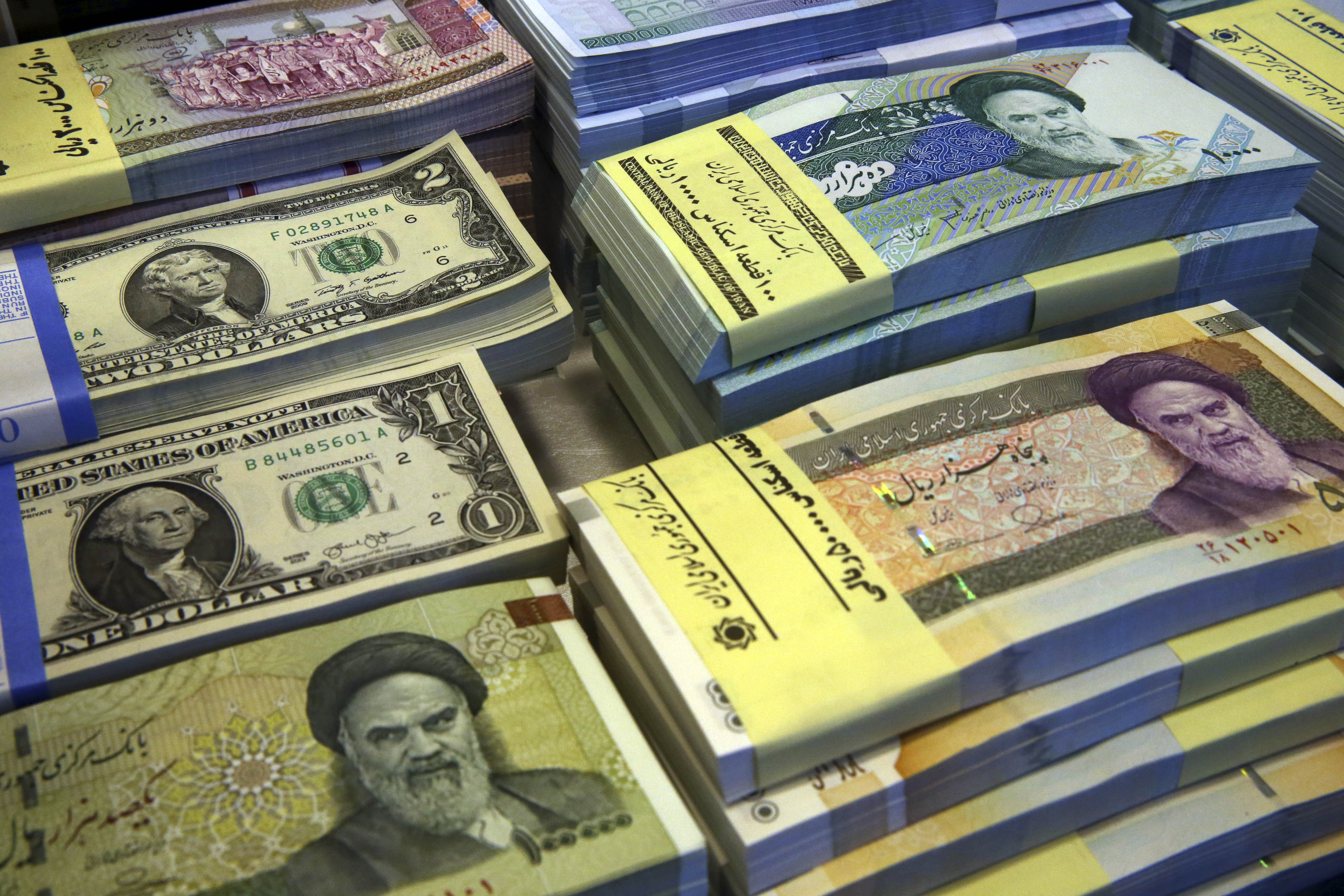 Iran to Dilute Dollar Role in Currency Basket in the Wake of Luxemburg Court Case