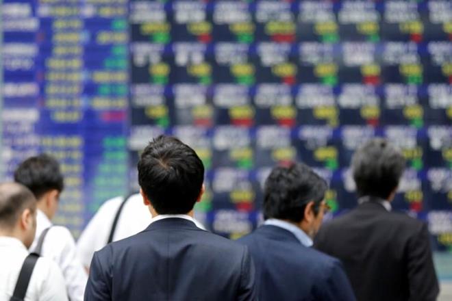 Asia stocks pull back as investors eye new risks; oil higher