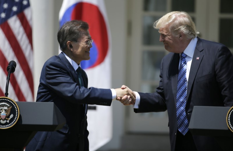 Trump calls for firm response to North Korea, targets Seoul on trade