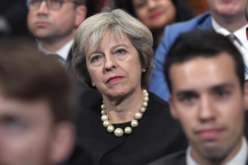May Scrapes Together Government as Tory Backlash Begins