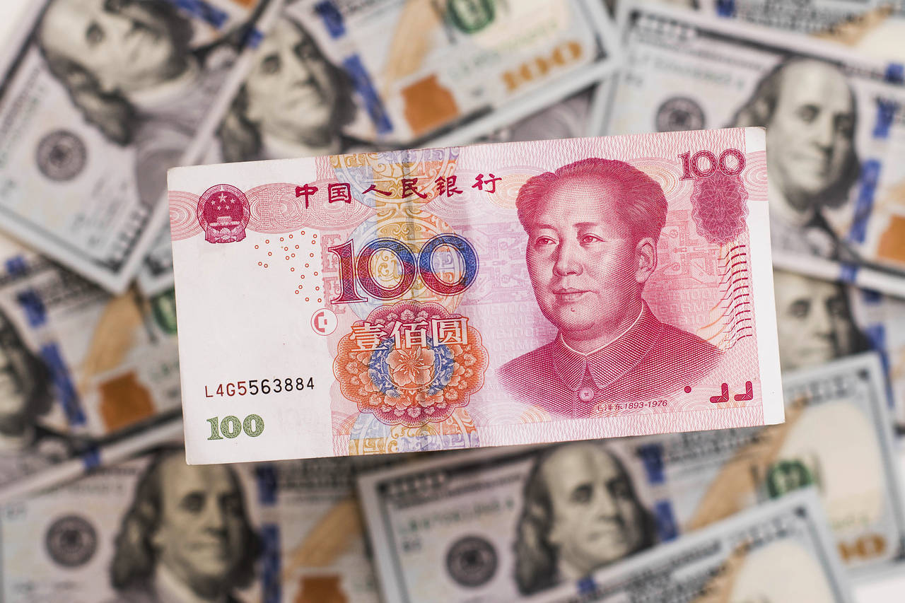 China, U.S. commit to refrain from competitive currency devaluations