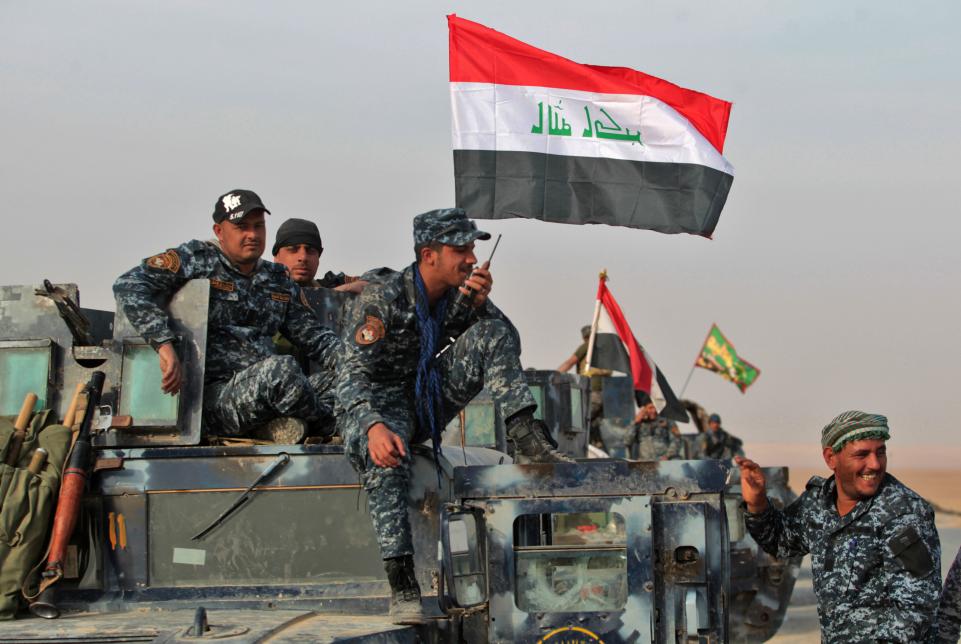 Iraqi troops seize main bridge, advance on mosque in battle for Mosul