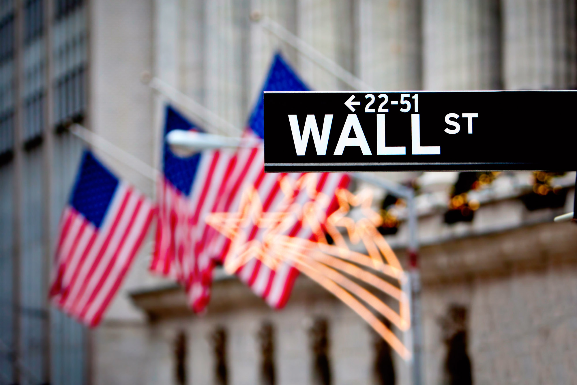 Wall Street opens flat as tech stocks slip