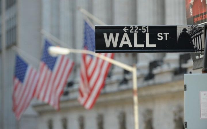 Wall Street slips on weak GDP data, but indexes rise in April