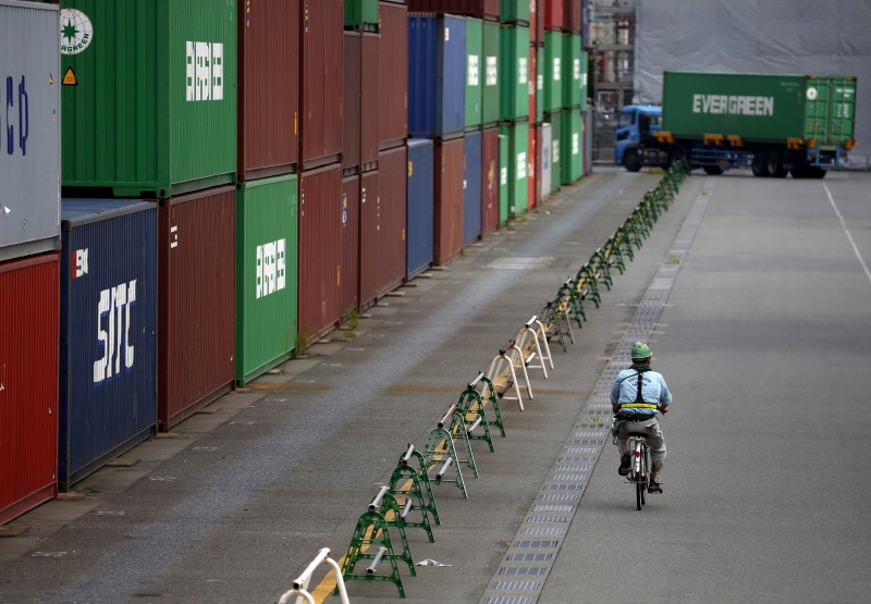 Exports prop up Japan fourth quarter GDP growth, U.S. protectionist risks loom