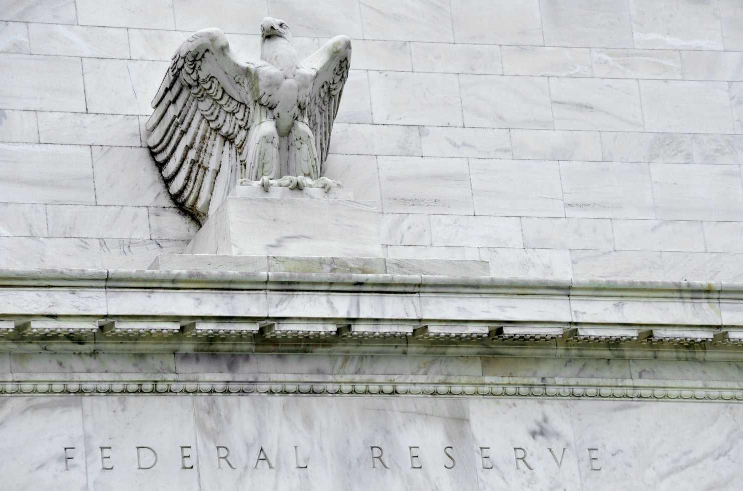 World stocks rise, dollar weakens on divided Fed