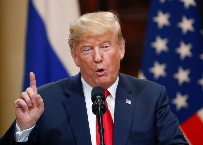 Trump, seeking to calm political storm over Putin summit, says he misspoke