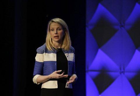 Yahoo beats Wall Street view, sees Verizon deal closing in second quarter