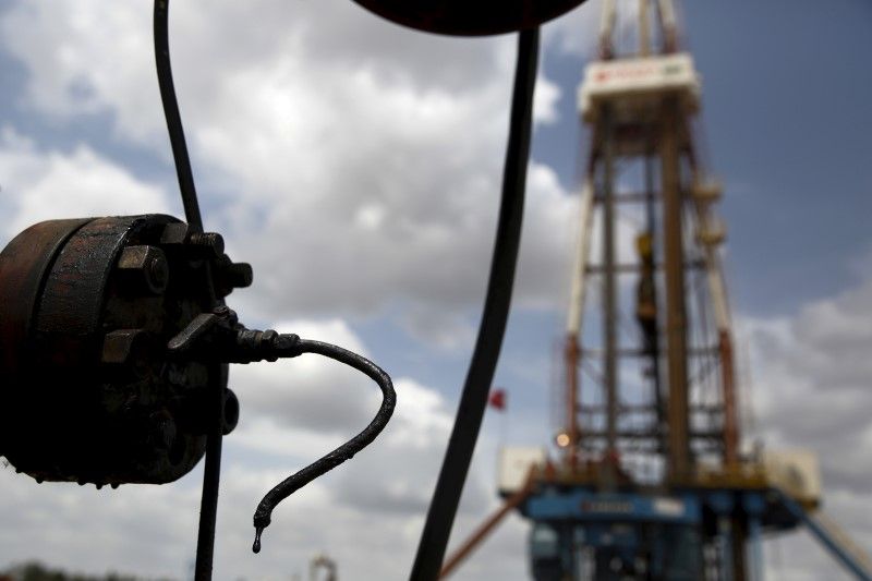 Oil steady in quiet holiday season trade; supply cut deal to kick in Jan 1