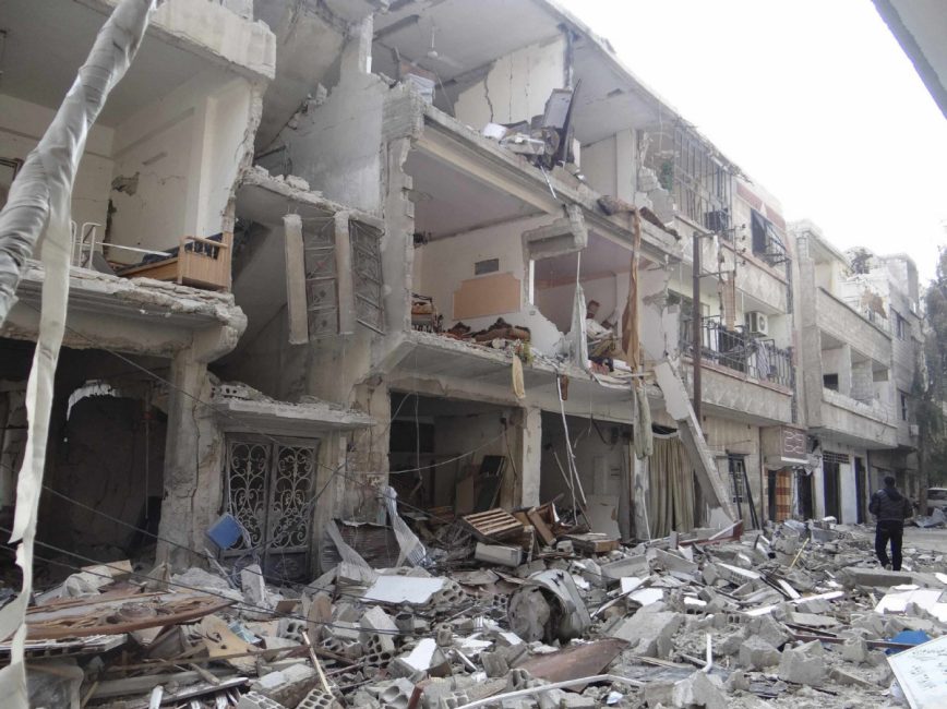 Syrian jets bomb rebel-held eastern Damascus suburbs, dozens killed