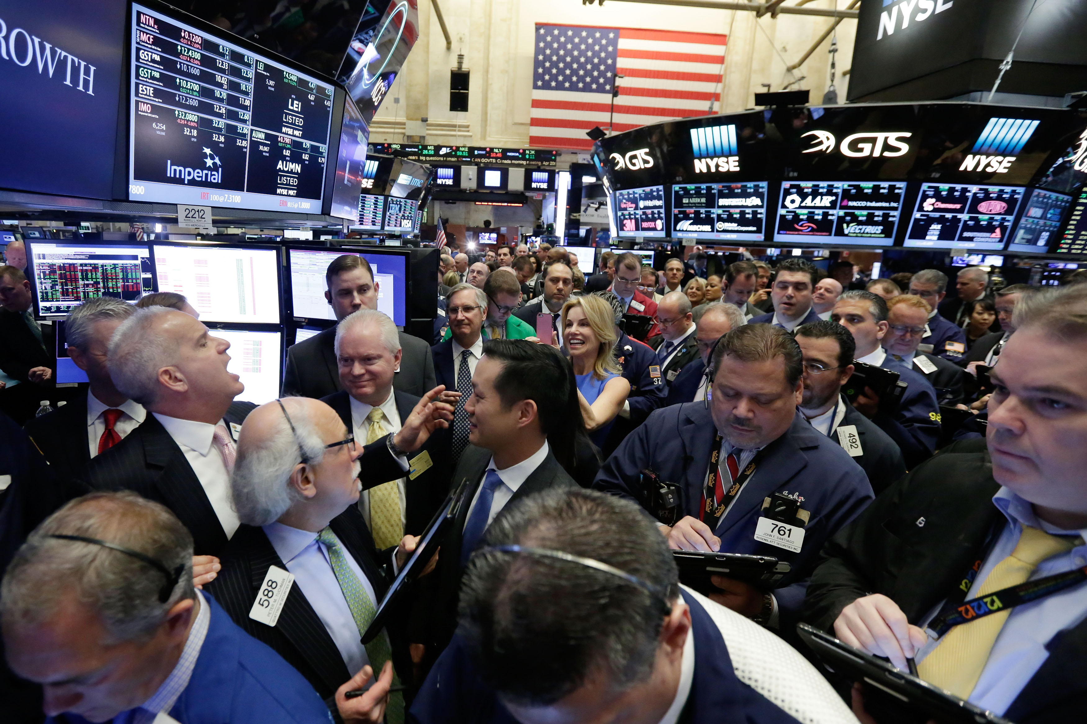 Gains in financials, energy shares lift Wall Street