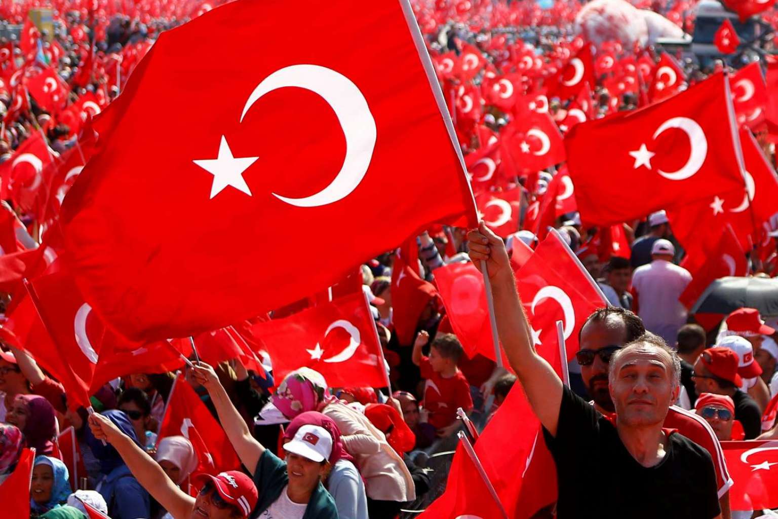 Turkey's Erdogan stages mass rally in show of strength after coup attempt