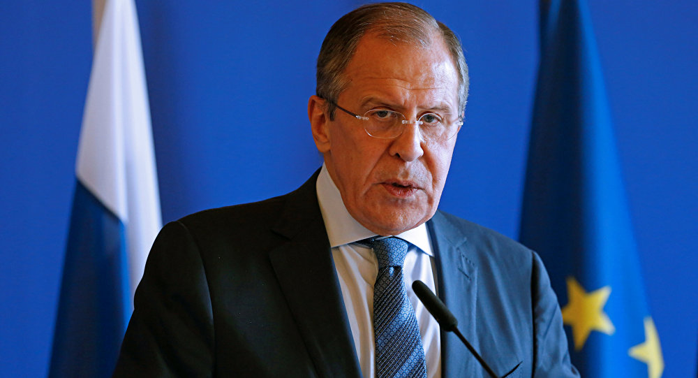 Russian foreign minister meets with Tillerson, denies interfering