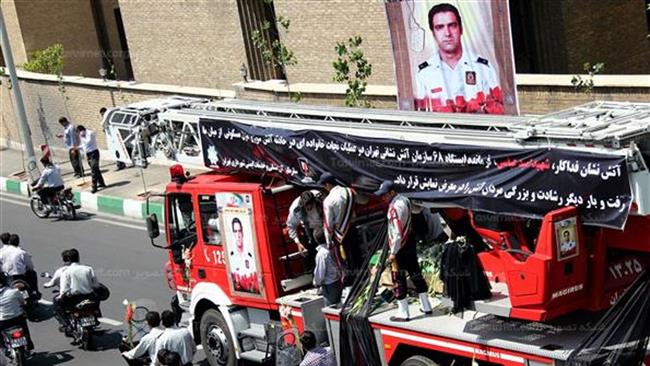 Firefighters buried at Behesht Zahra Cemetery