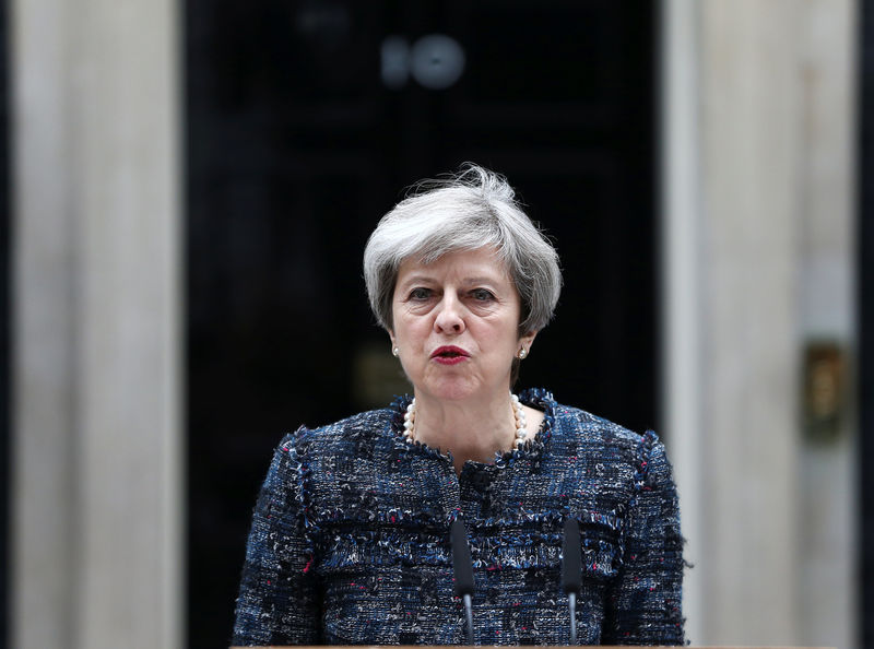 UK PM Theresa May maintains strong election lead in weekend opinion polls