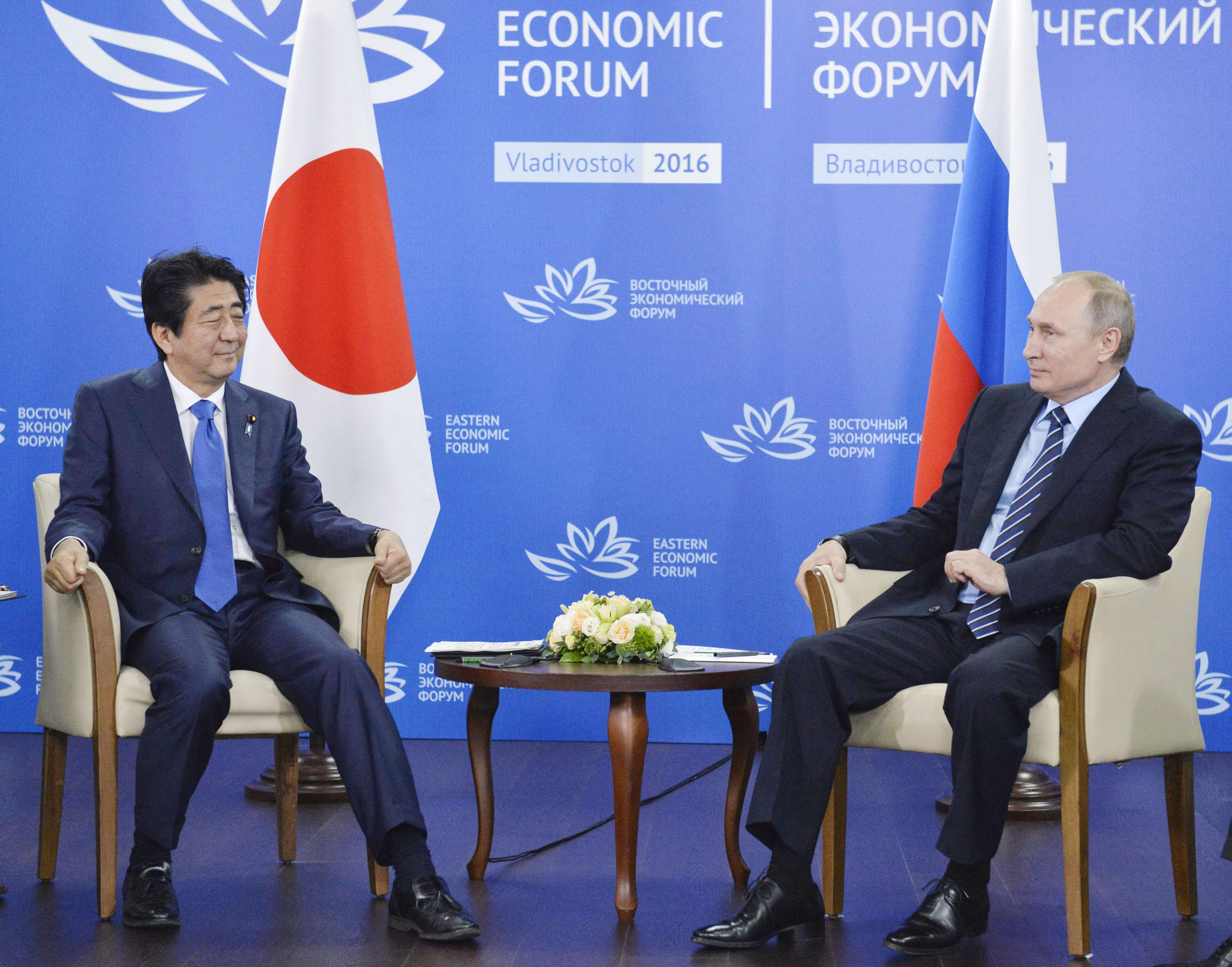 Russian, Japanese leaders express new resolve to settle island row