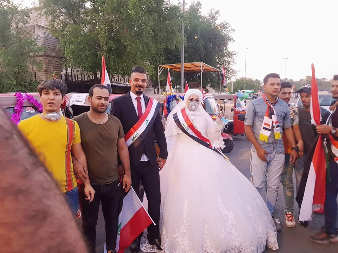 عروس و داماد عراقی در میدان التحریر بغداد +عکس