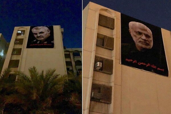 تصاویر شهیدان «سلیمانی» و «ابومهدی» بر ساختمان مقابل سفارت آمریکا