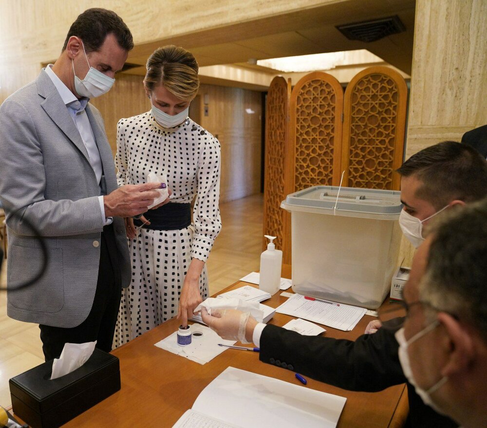 بشار اسد و همسرش پای صندوق رای +عکس
