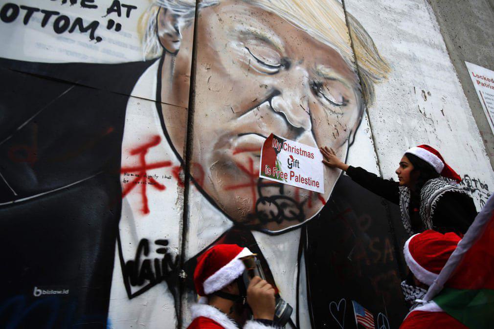 نقاشی دیواری تصویر ترامپ روی دیوار شهر بیت‌لحم +عکس
