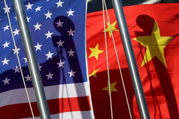 چین: آمریکا عملا در حال شلیک آتش به طرف جهان است