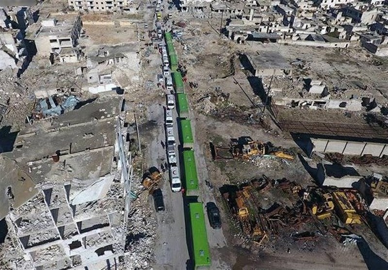خروج تروریست ها از حلب با اتوبوس دولتی +عکس