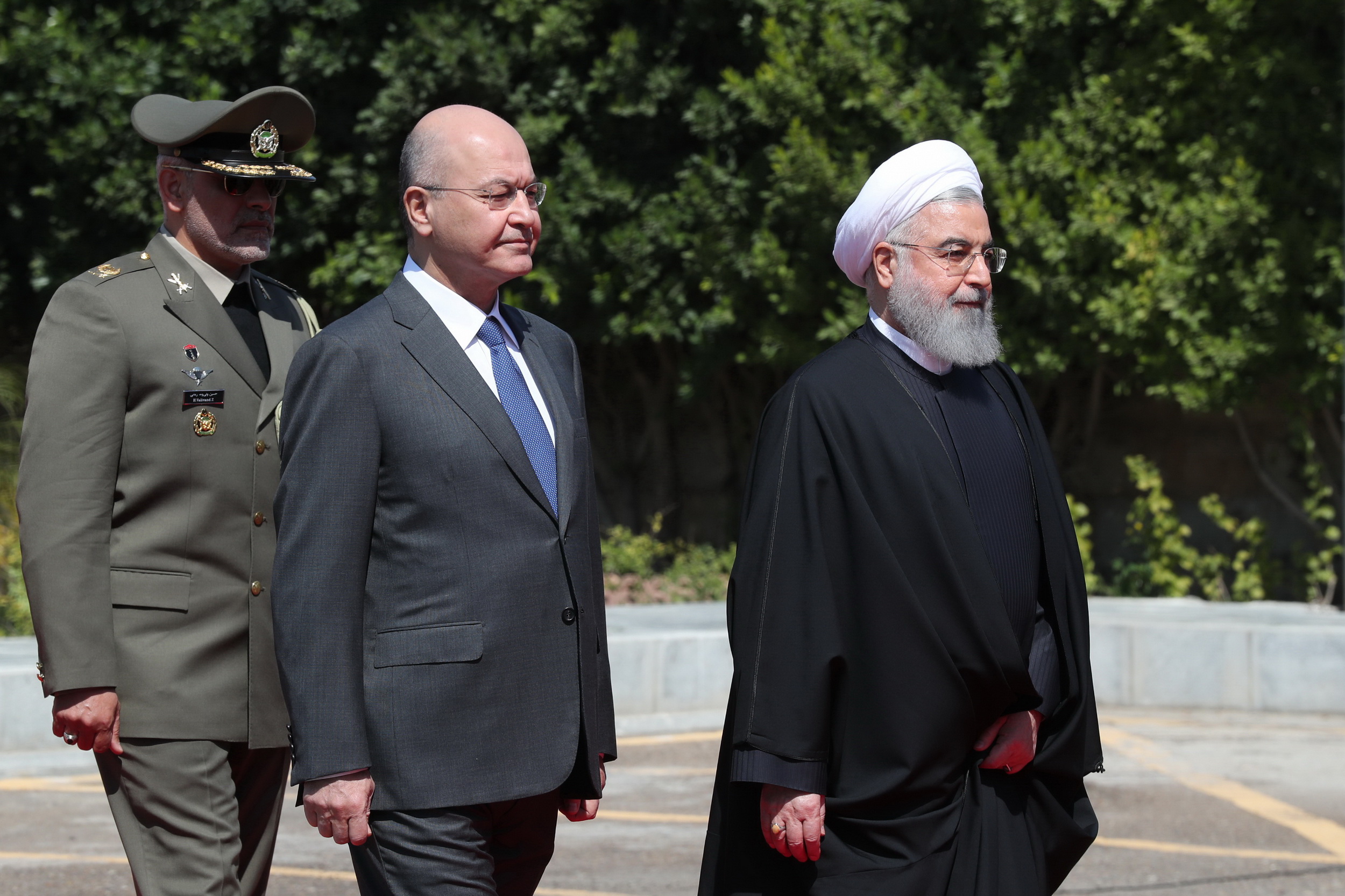 الجزیره: سفر روحانی به عراق پیامی برای آمریکاست