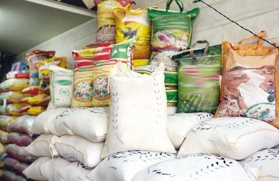 توقف کامیون‌های برنج وارداتی به اتهام واردات